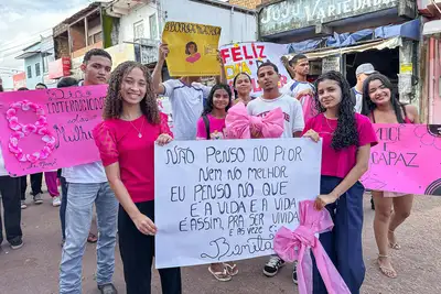 notícia: Escola Estadual promove 3ª caminhada em homenagem ao Dia Internacional da Mulher 