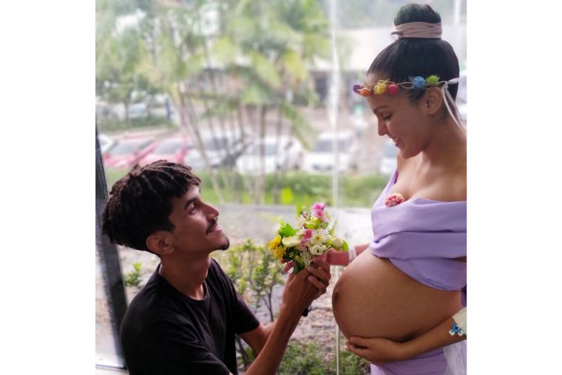 Laís de Oliveira e seu marido. 