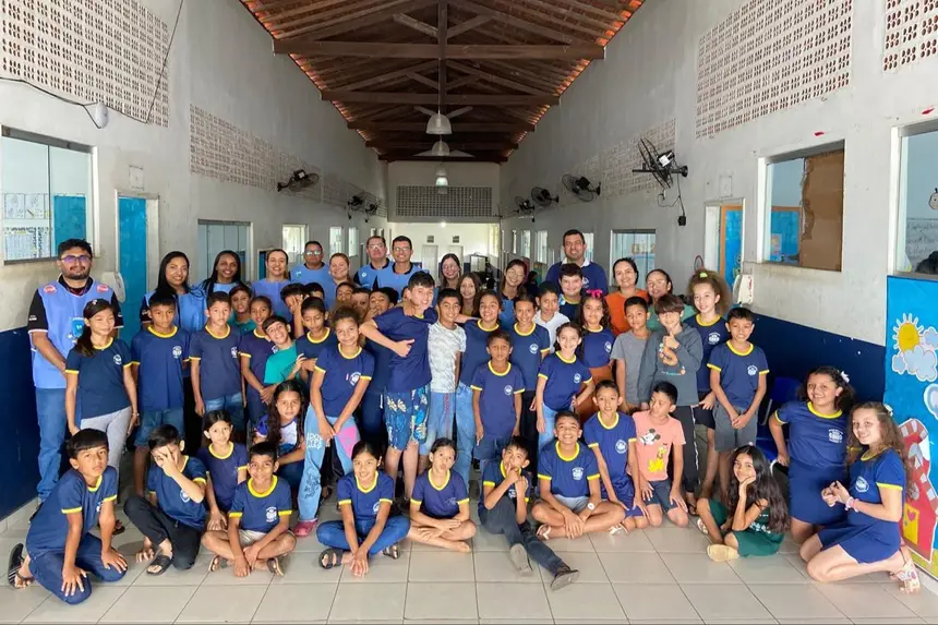 Comissão de sustentabilidade do HRPC na escola ação sobre conscientização do racionamento de água.