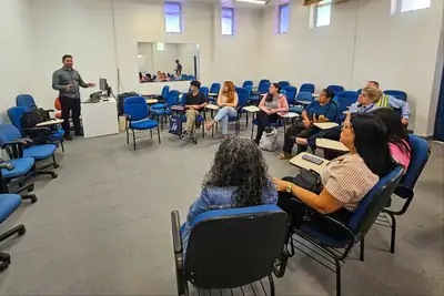 notícia: Seju promove formação sobre práticas migratórias e proteção a migrantes no Aeroporto de Belém